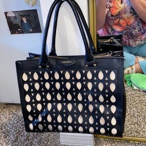 Nine West Beautiful Black 3 pockets with cut out front!